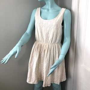 An off white/ Ivory lace dress in an A-line style is a great look for spring!